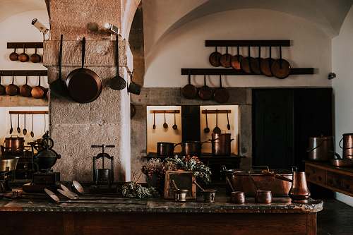 interior design kitchen filled with cooking pans and kitchen utensils indoors